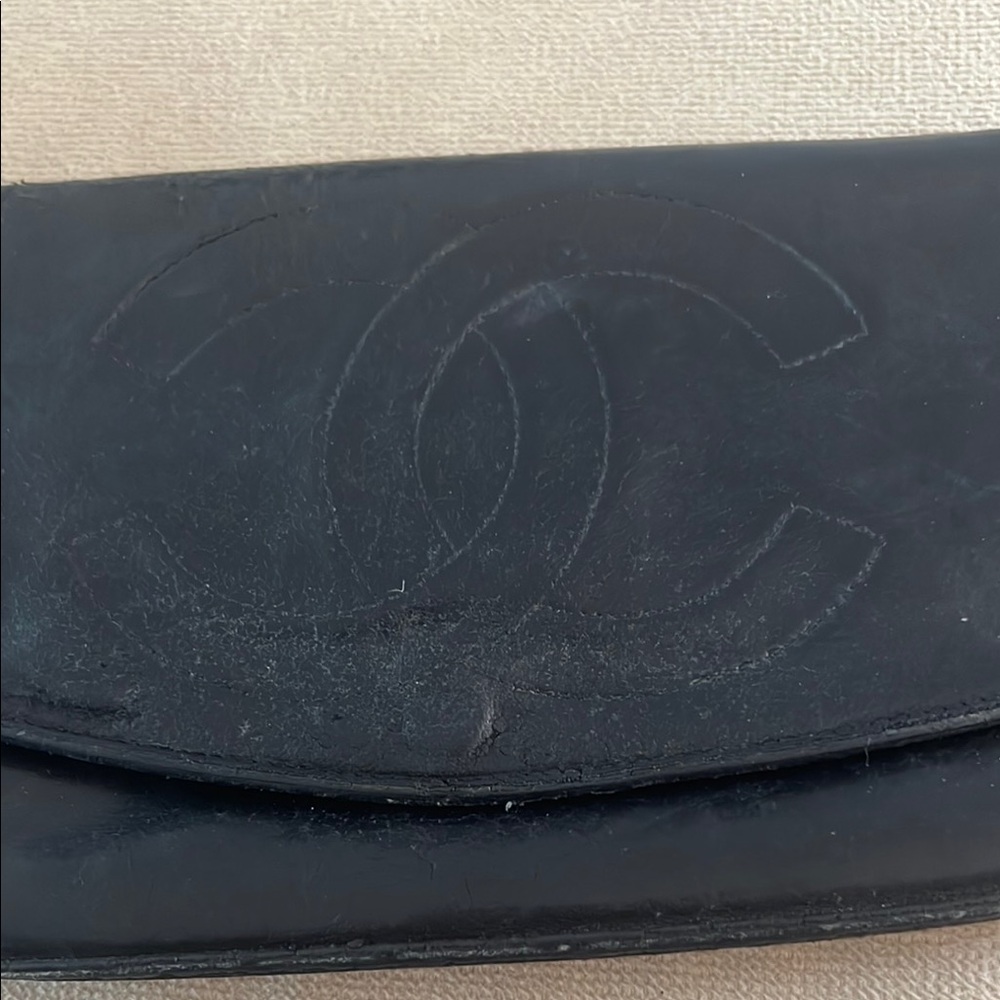 CHANEL Black Leather Pouch with Gold Logo Button.. see pics for measurements…